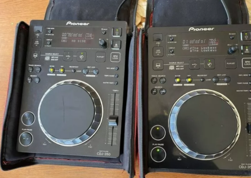 Pioneer CDJ 350 pair for sale with carry bags.